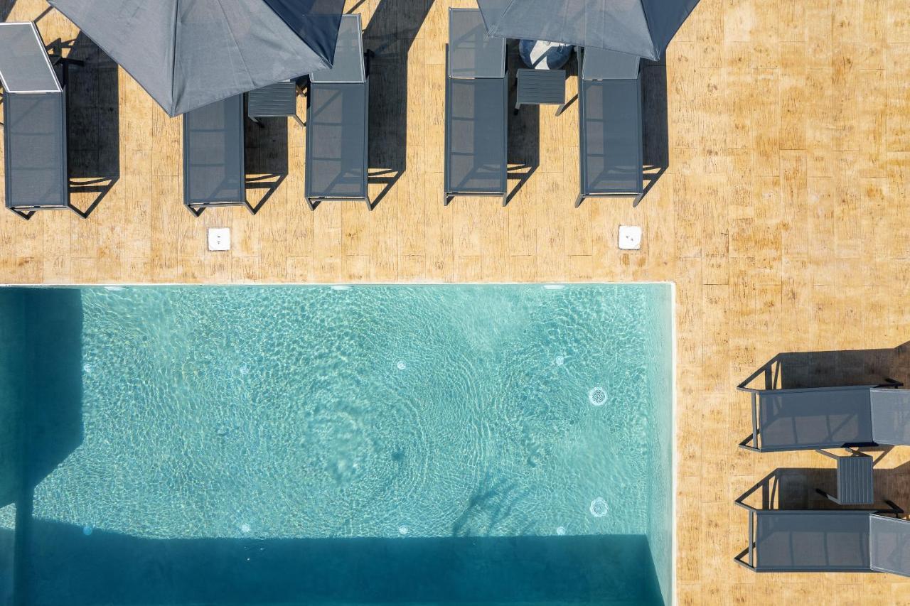Pietra Di Mare Aparthotel Petres  Bagian luar foto